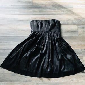 Black Calvin Klein cocktail dress with pintucks